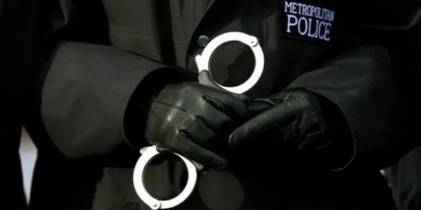 Hackney man charged with starting fires in London Fields 691_met police cuffs.jpg